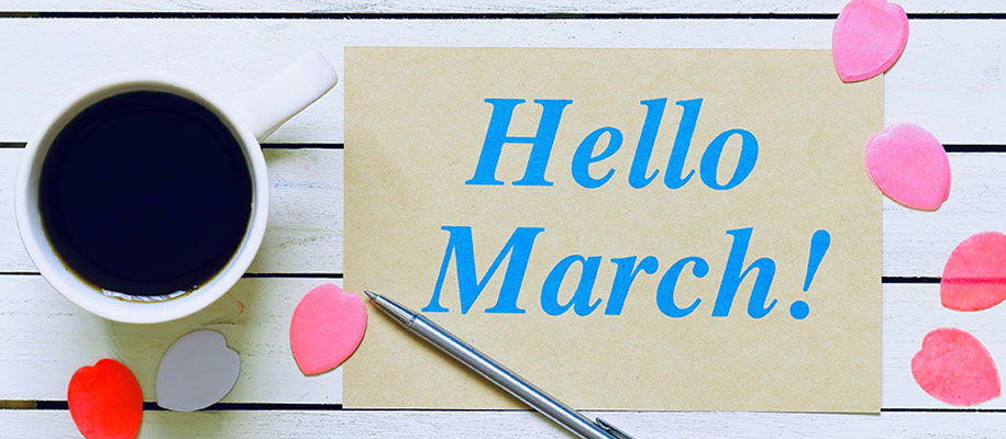 Note with Hello March! printed in blue pink next to coffee cup and flower petals